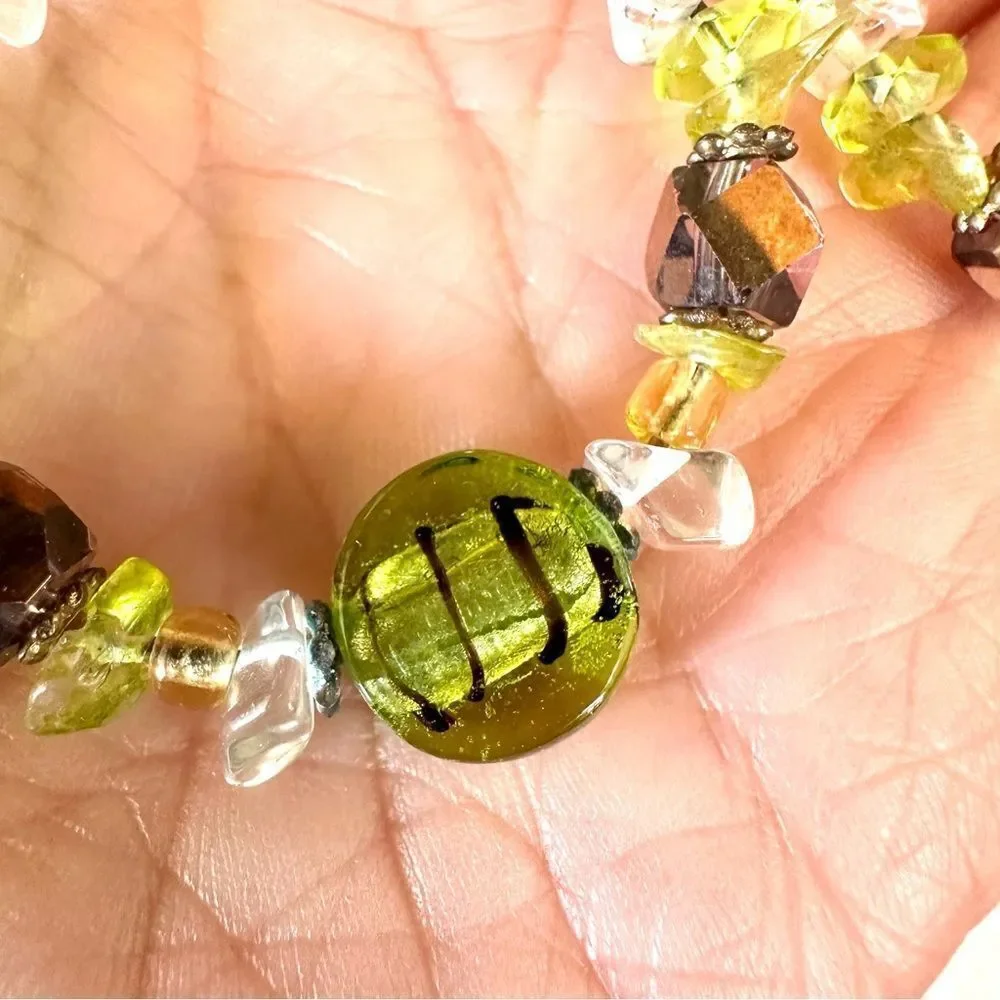 Green beaded circle earrings